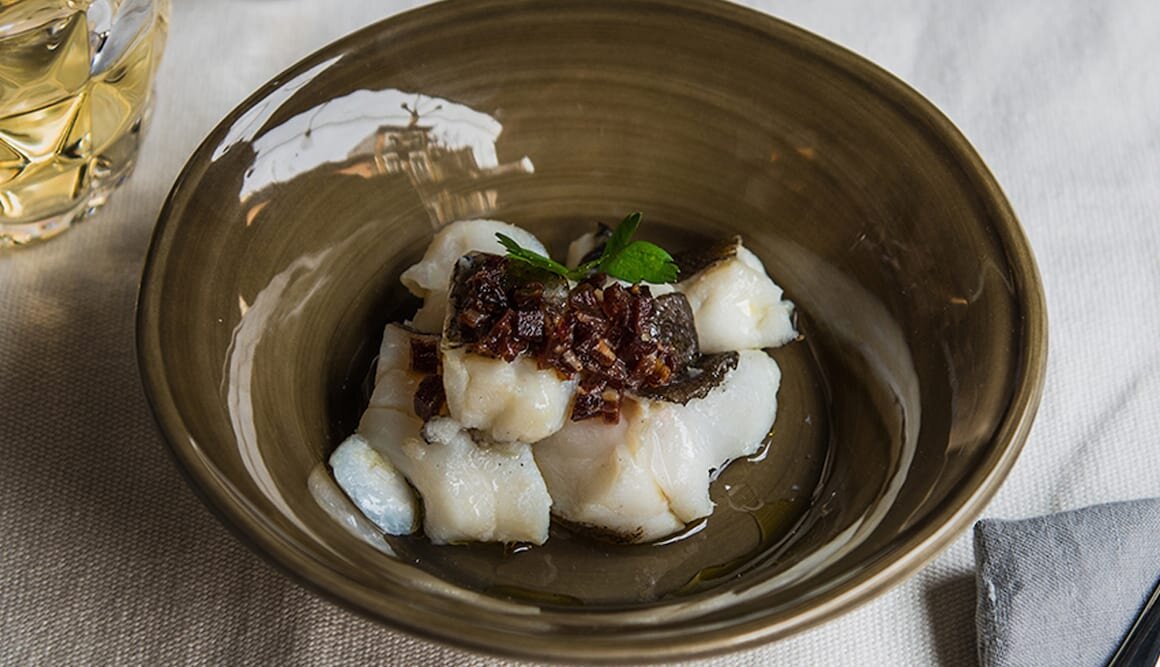 Tapa de Skrei con chicharrón y cecina de buey ahumados by Viviana Calderón