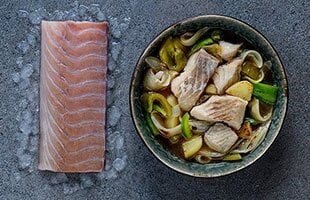 Guiso de fogonero noruego con patatas y pimiento choricero